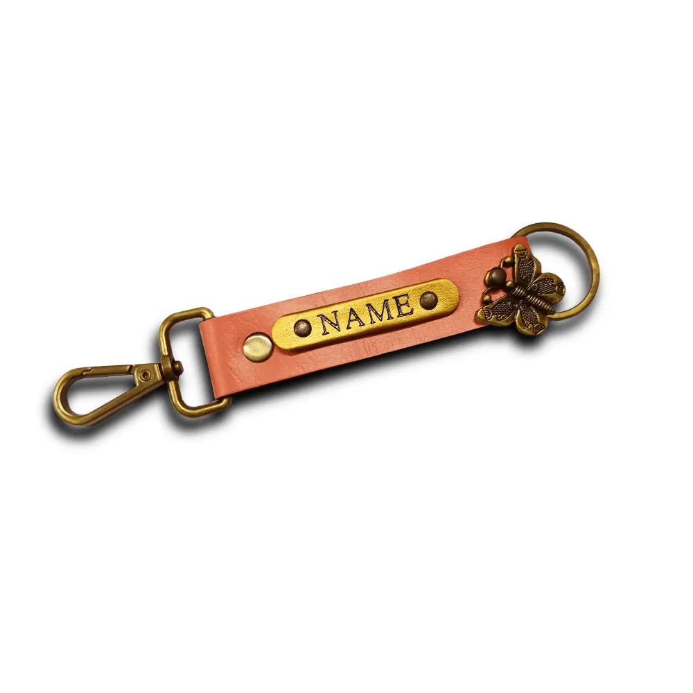 Customized Peach Keychain with Name & Floral Charm | CUG Customized peach keychain with name badge and floral charm by CUG