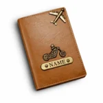 Customized tan passport cover with name engraving and motorcycle charm by CUG